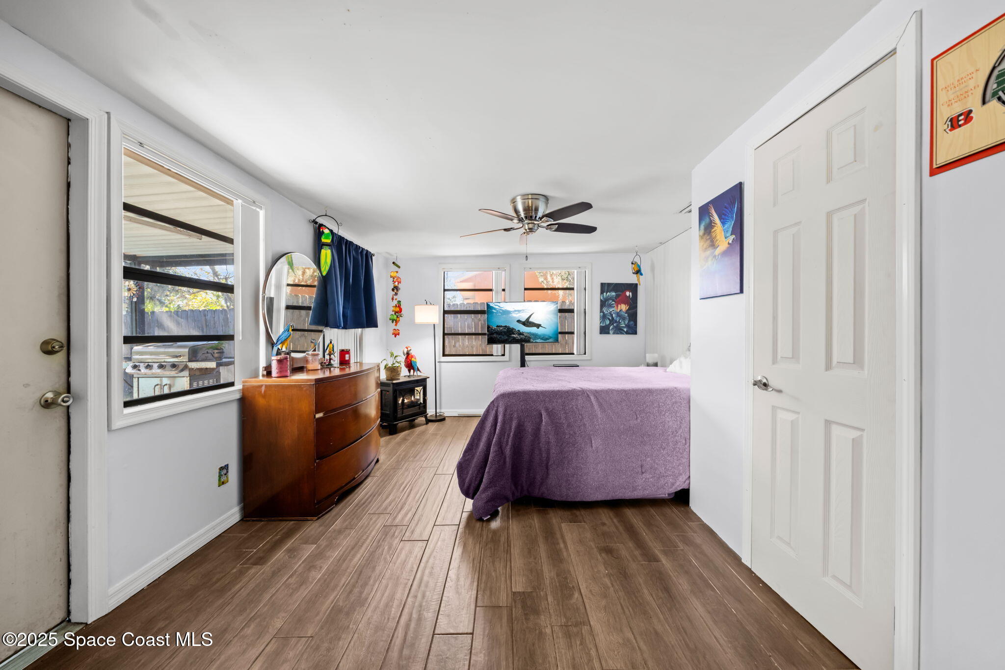 4257 Piedras Street Cocoa, FL 32927 - Photo 10 of 23 a living room with furniture and a wooden floor