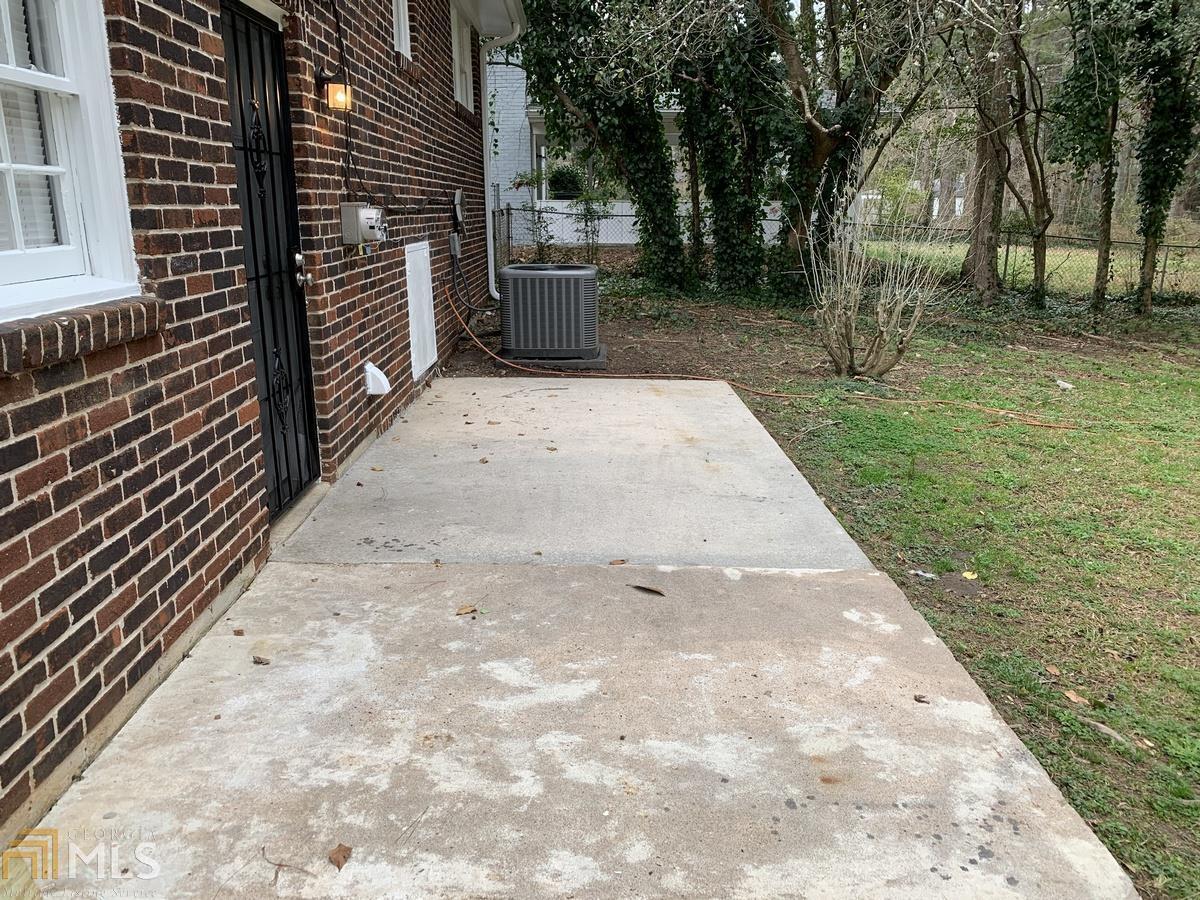 2386 Miriam Lane Decatur, GA 30032 - Photo 19 of 20 a view of a patio with wooden fence