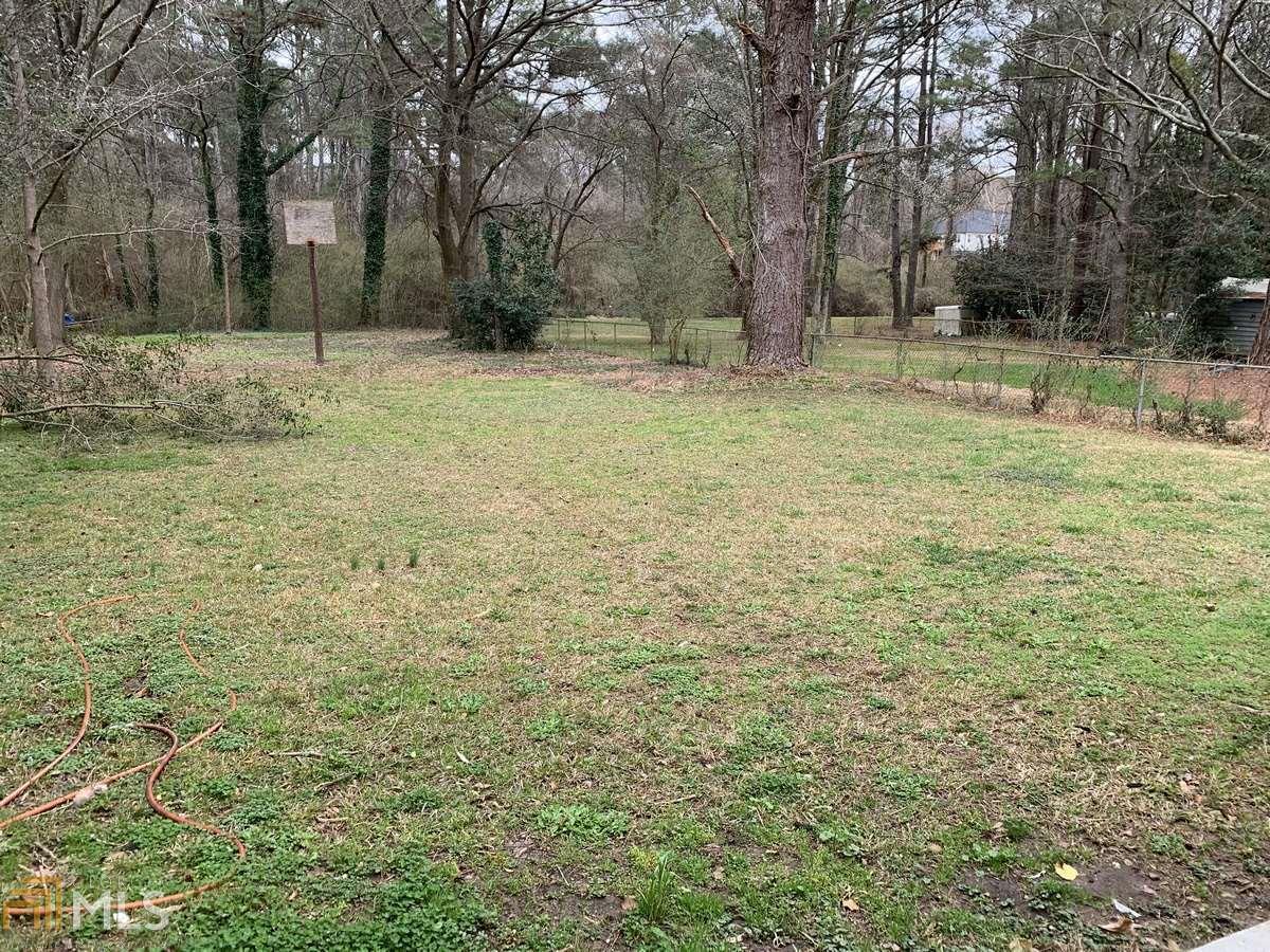 2386 Miriam Lane Decatur, GA 30032 - Photo 20 of 20 a fire hydrant in the middle of a field