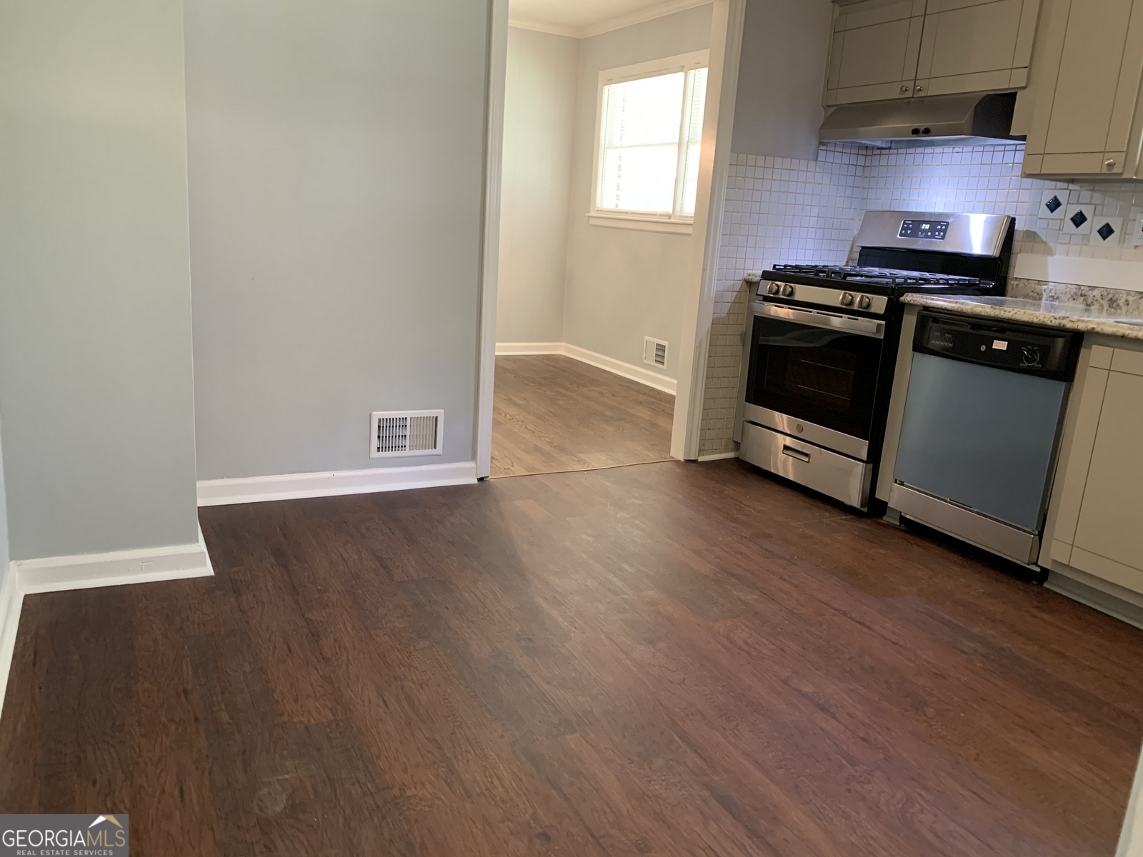 2386 Miriam Lane Decatur, GA 30032 - Photo 8 of 20 a kitchen with wooden floors and a stove