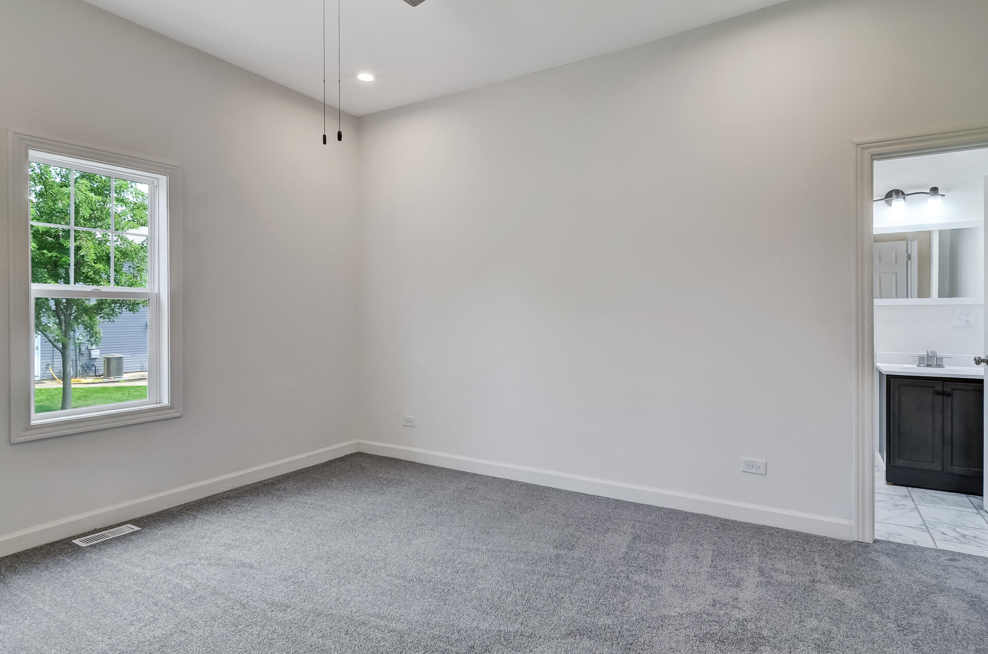 246 142nd Street Hammond, IN 46327 - Photo 12 of 30 an empty room with windows