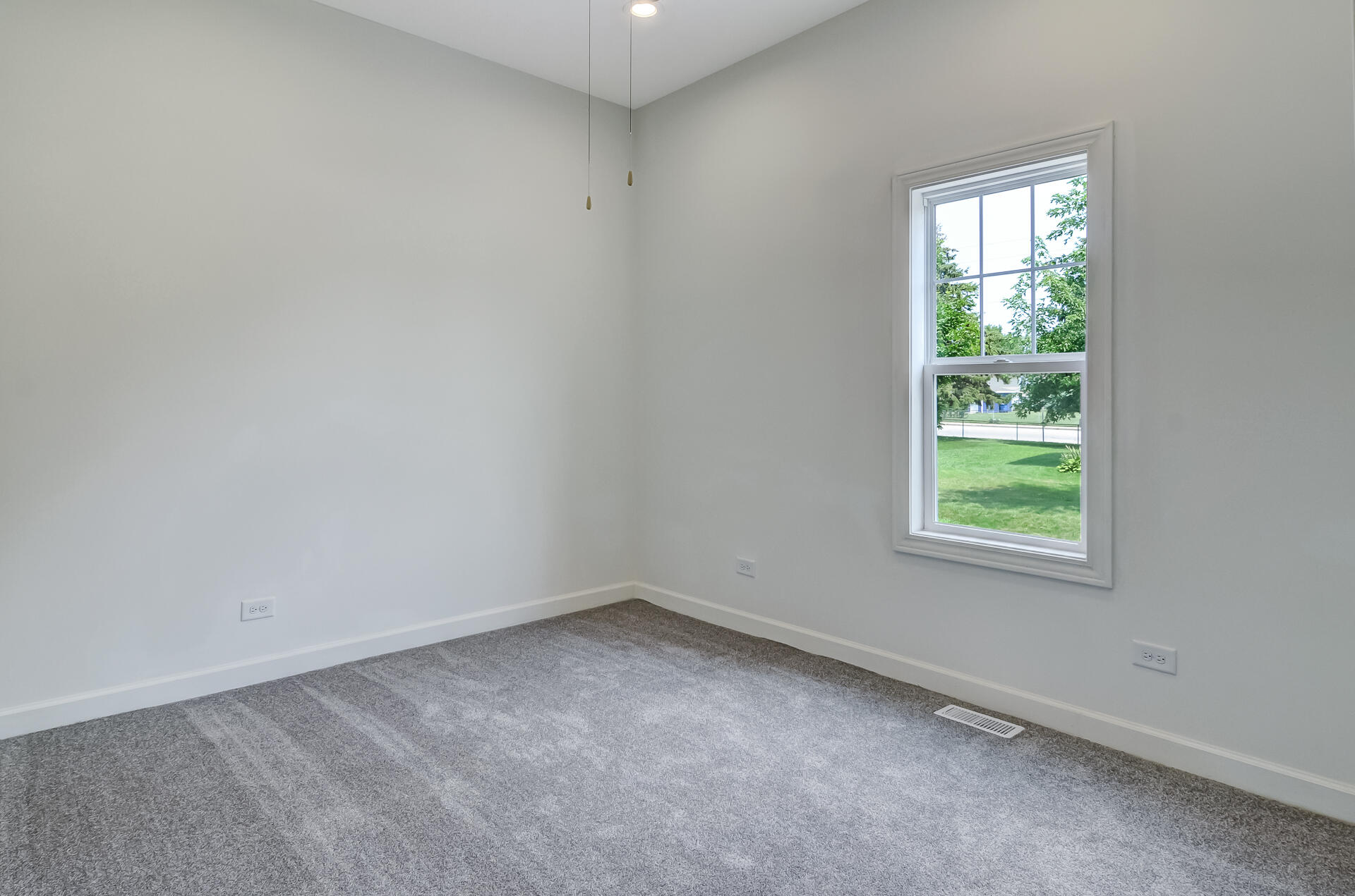 246 142nd Street Hammond, IN 46327 - Photo 16 of 30 an empty room with a window