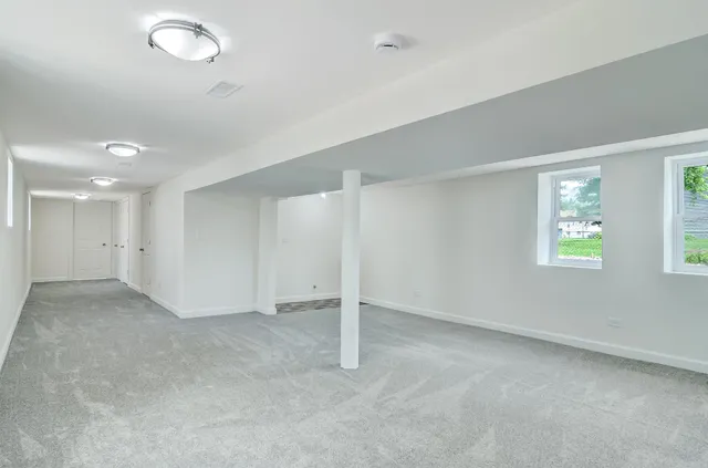 an empty room with windows