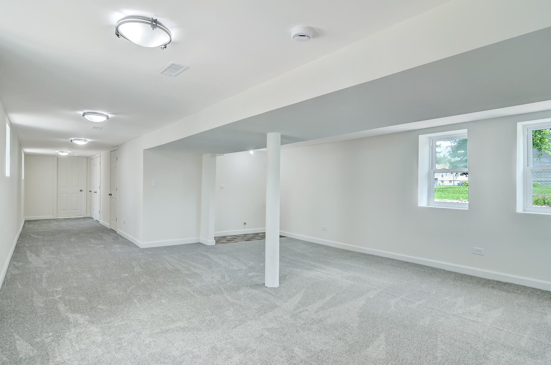 246 142nd Street Hammond, IN 46327 - Photo 17 of 30 an empty room with windows