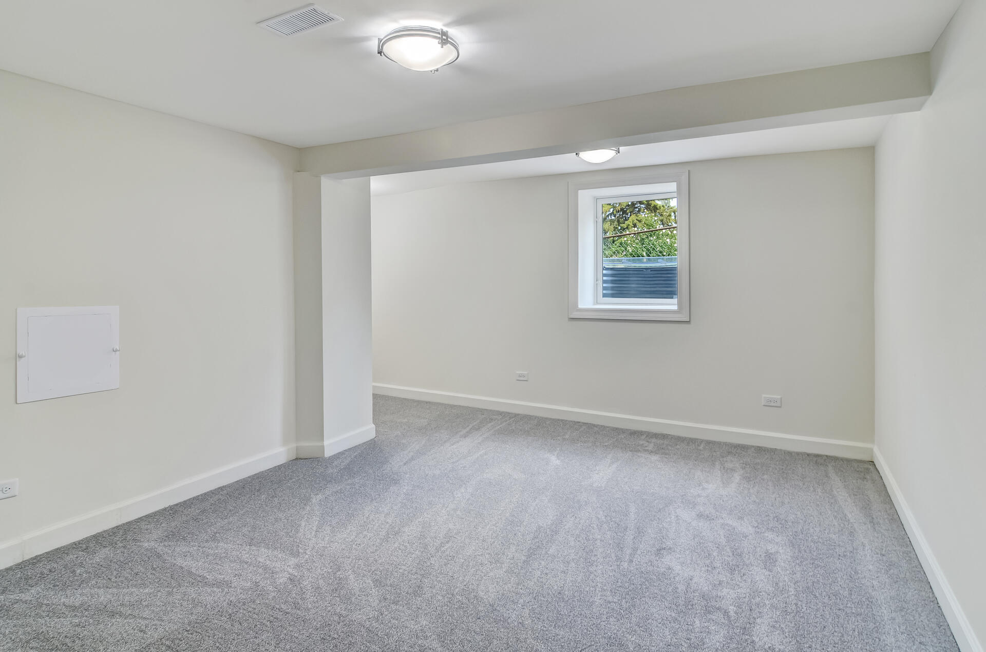 246 142nd Street Hammond, IN 46327 - Photo 20 of 30 an empty room with a window