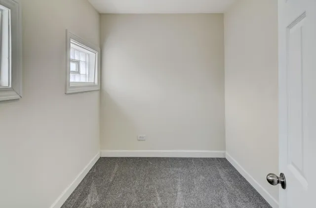 a view of an empty room with window