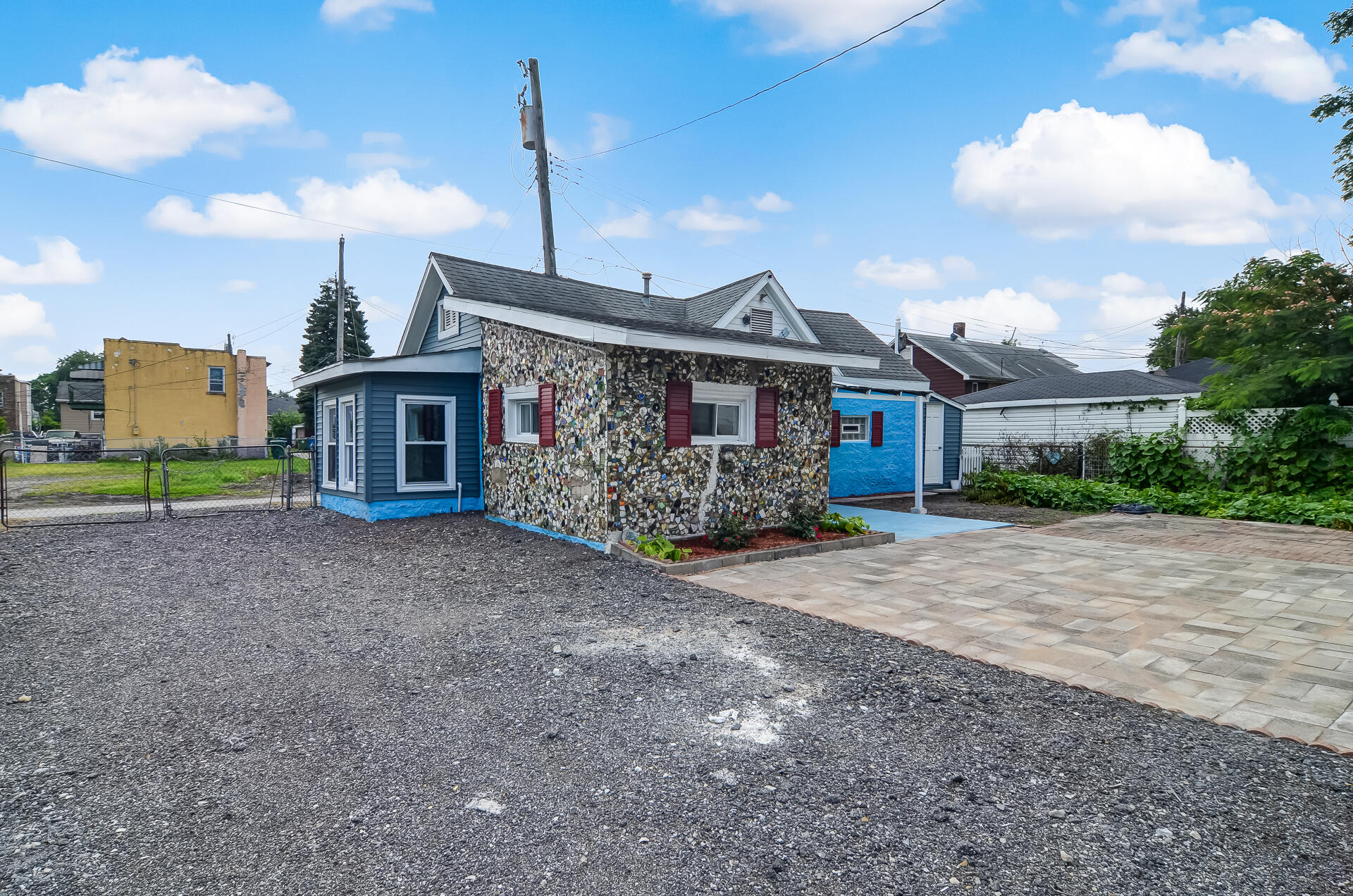 246 142nd Street Hammond, IN 46327 - Photo 5 of 30 a view of a house with a yard and plants