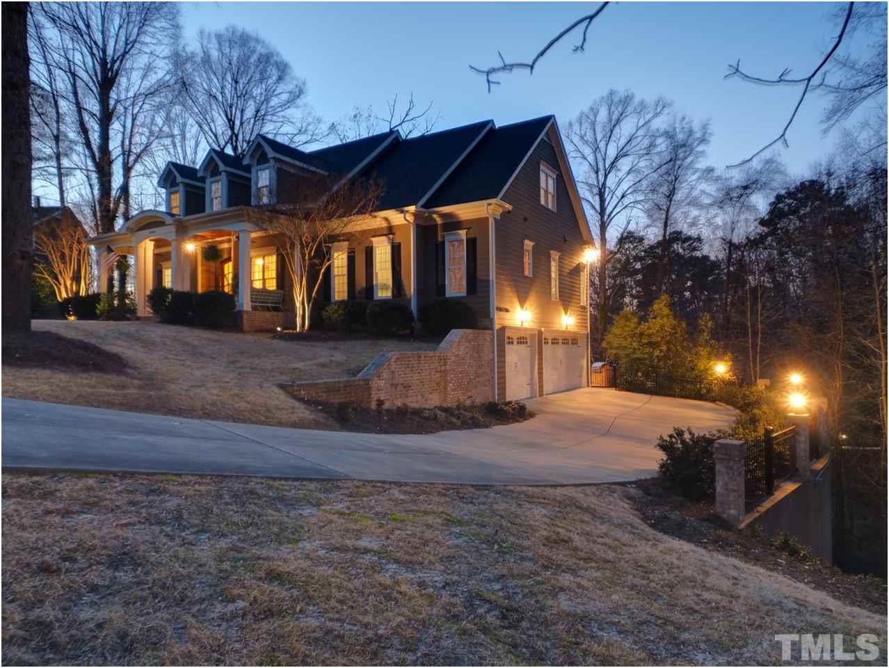 3408 Ocotea Street Raleigh, NC 27607 - Photo 2 of 25 a view of a house with a yard