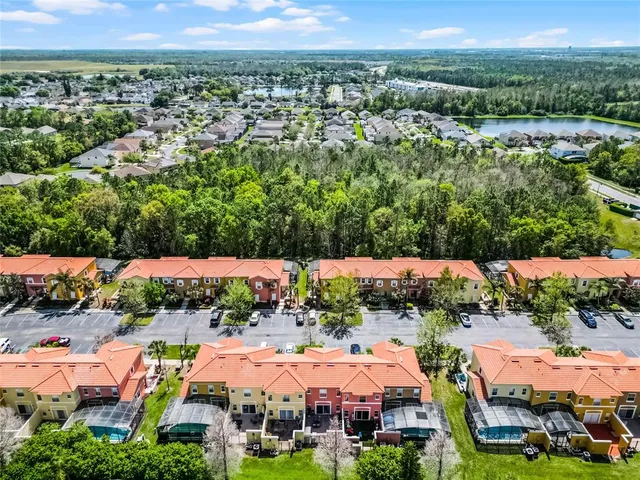 a view of a swimming pool with a table and chairs
