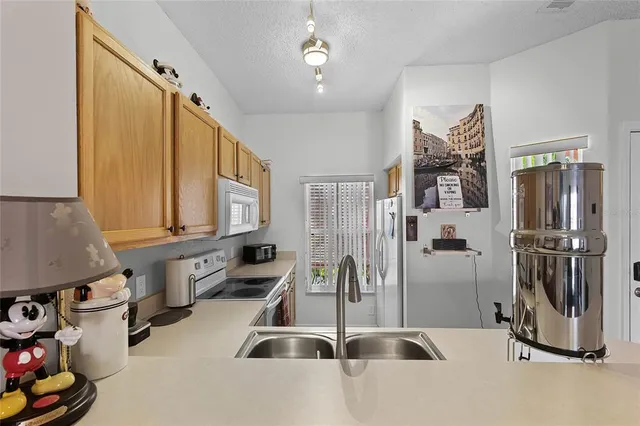 a very nice looking dining room with a large window