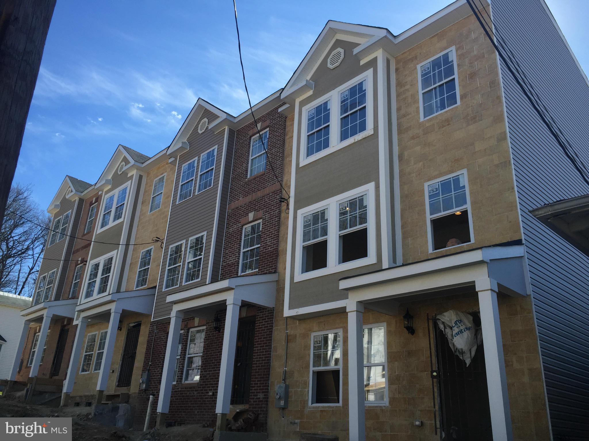 1778 W Street Southeast Washington, DC 20020 - Photo 1 of 16 a front view of a multi story building