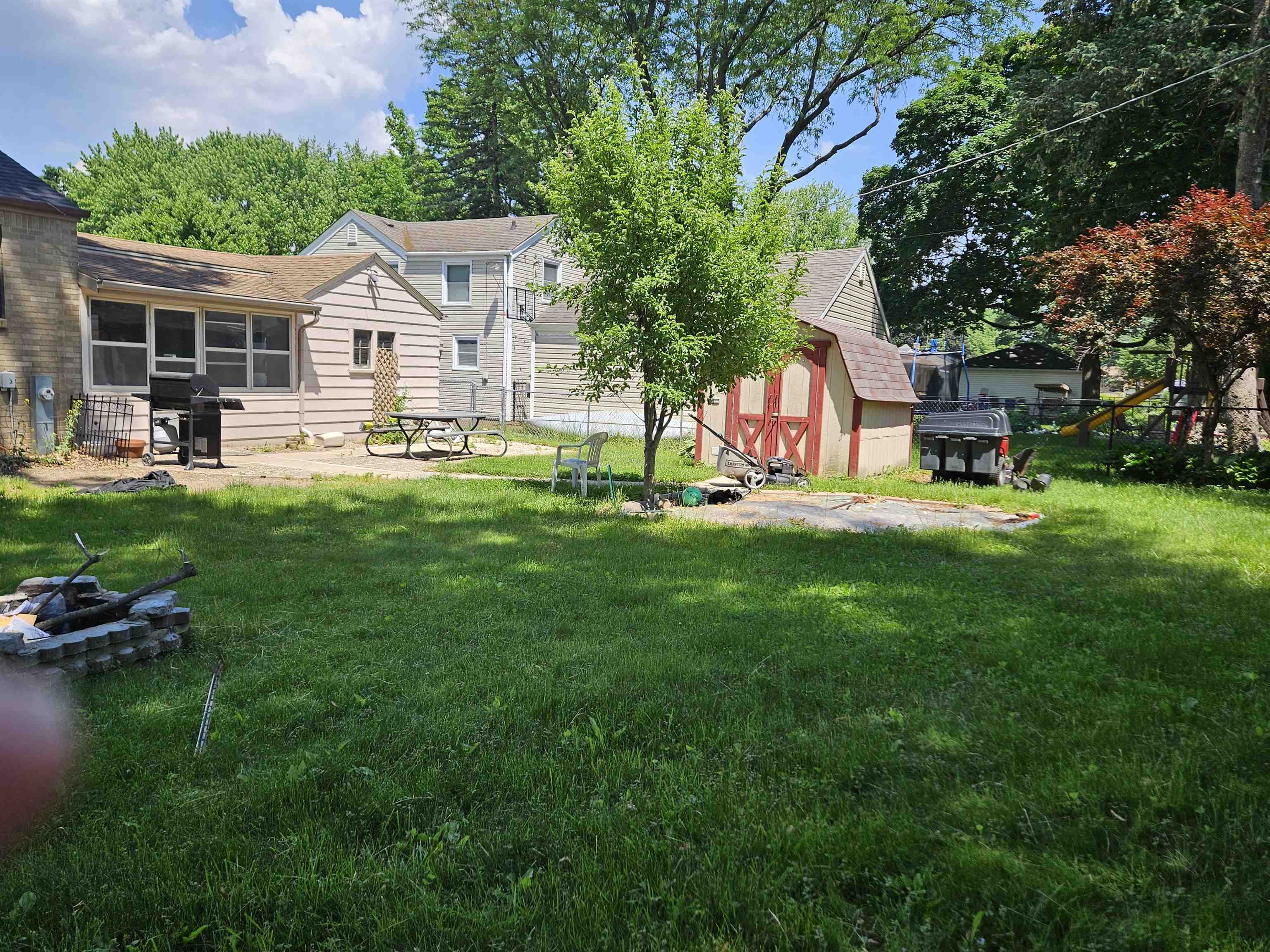 3807 Pinecrest Road Rockford, IL 61107 - Photo 3 of 3 a view of a house with backyard and sitting area