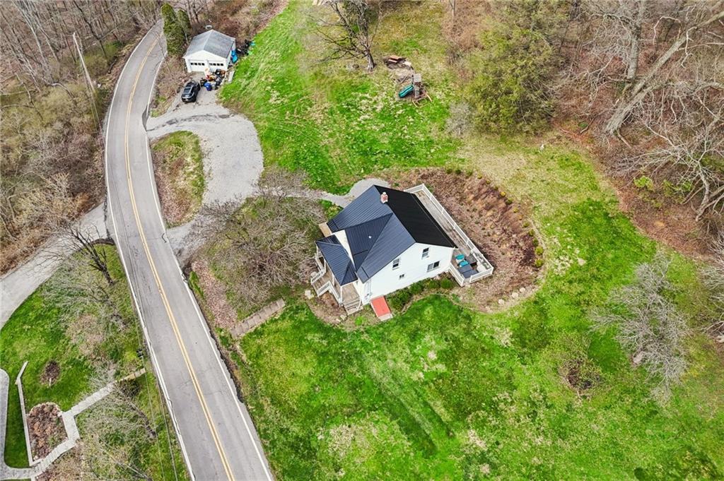6012 Cunningham Road Gibsonia, PA 15044 - Photo 25 of 26 an aerial view of a house with garden space and street view