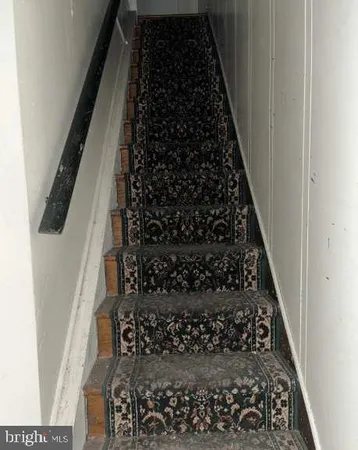 a view of wooden floor and a microwave