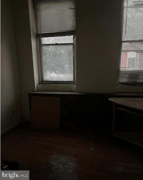 1110 South 7th Street Philadelphia, PA 19147 - Photo 5 of 16 a view of wooden floor and a microwave