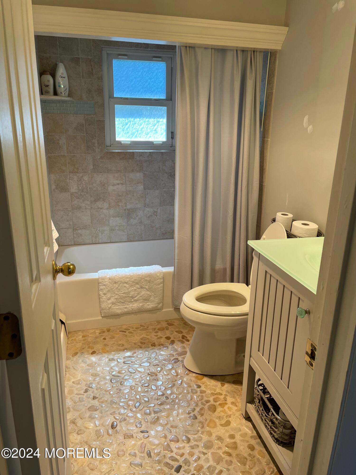 77 Jib Lane Brick, NJ 08723 - Photo 13 of 23 a bathroom with a sink toilet and shower