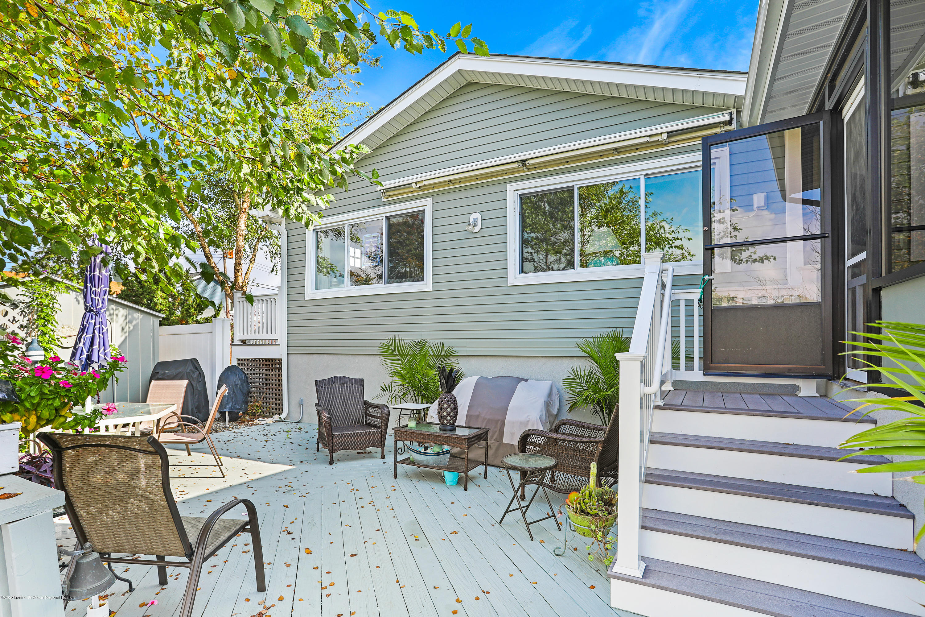 77 Jib Lane Brick, NJ 08723 - Photo 14 of 23 a view of backyard with outdoor seating and plants