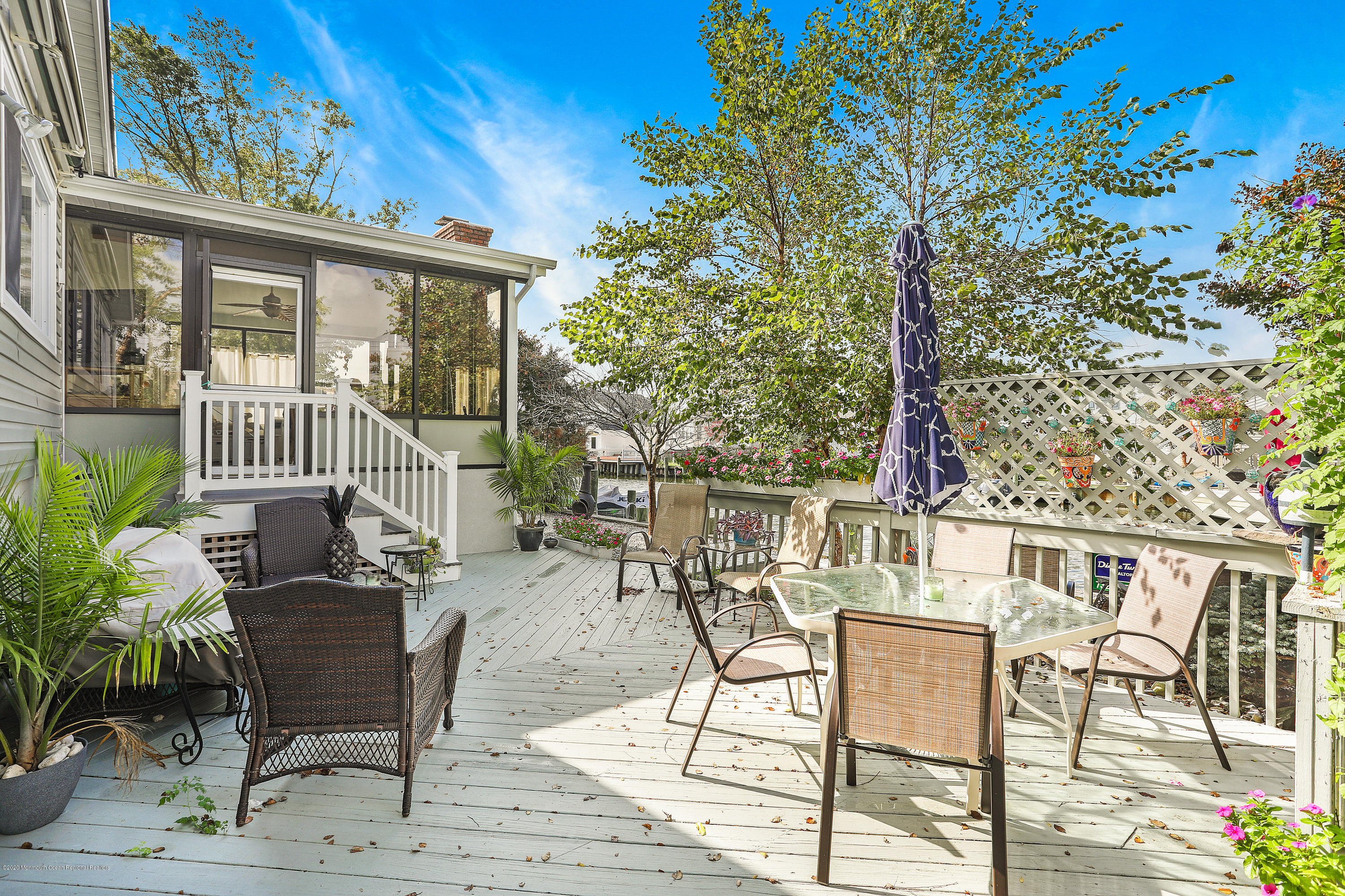 77 Jib Lane Brick, NJ 08723 - Photo 15 of 23 a view of a patio with couple of chairs