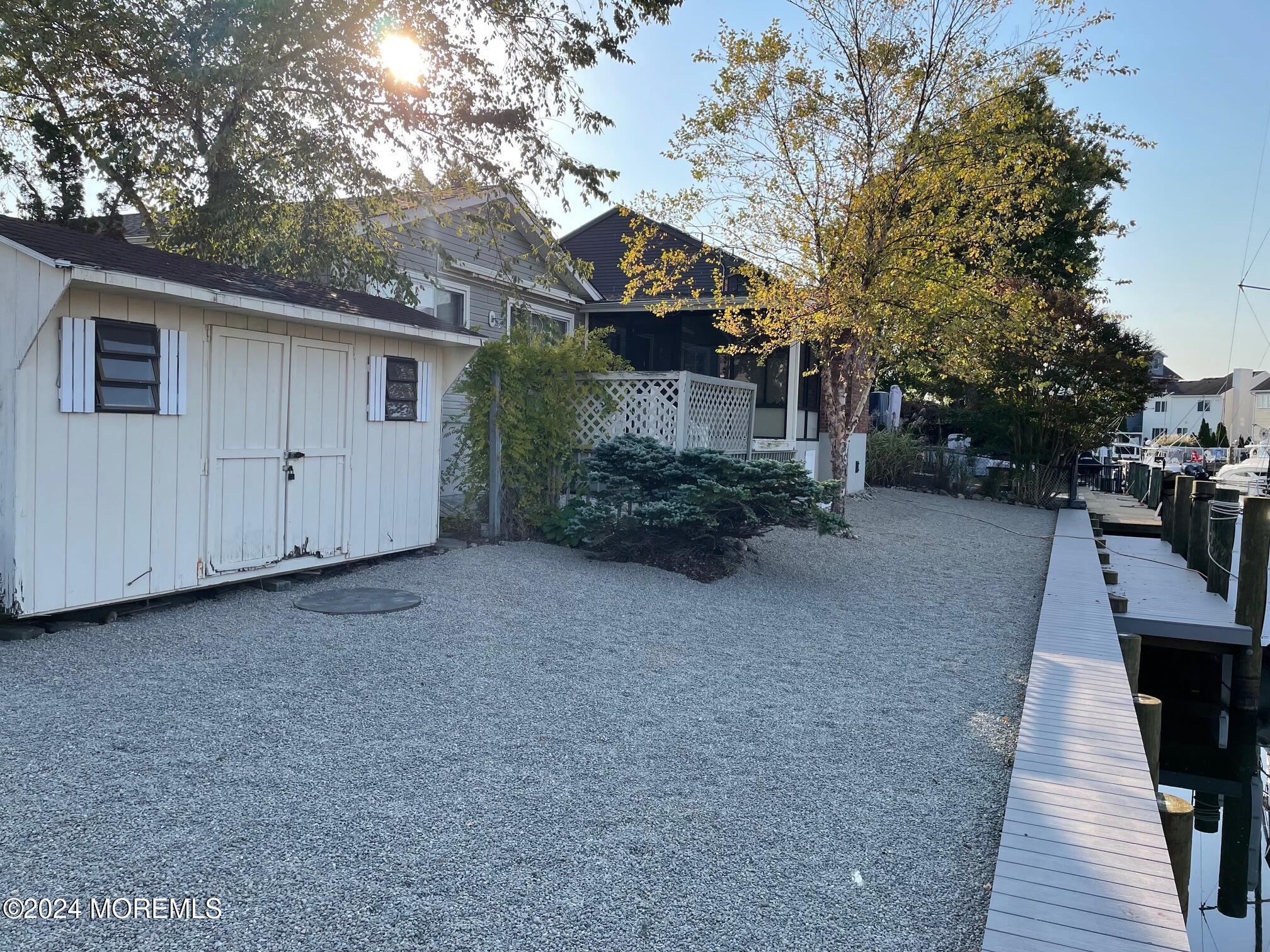 77 Jib Lane Brick, NJ 08723 - Photo 18 of 23 a view of a house with a yard