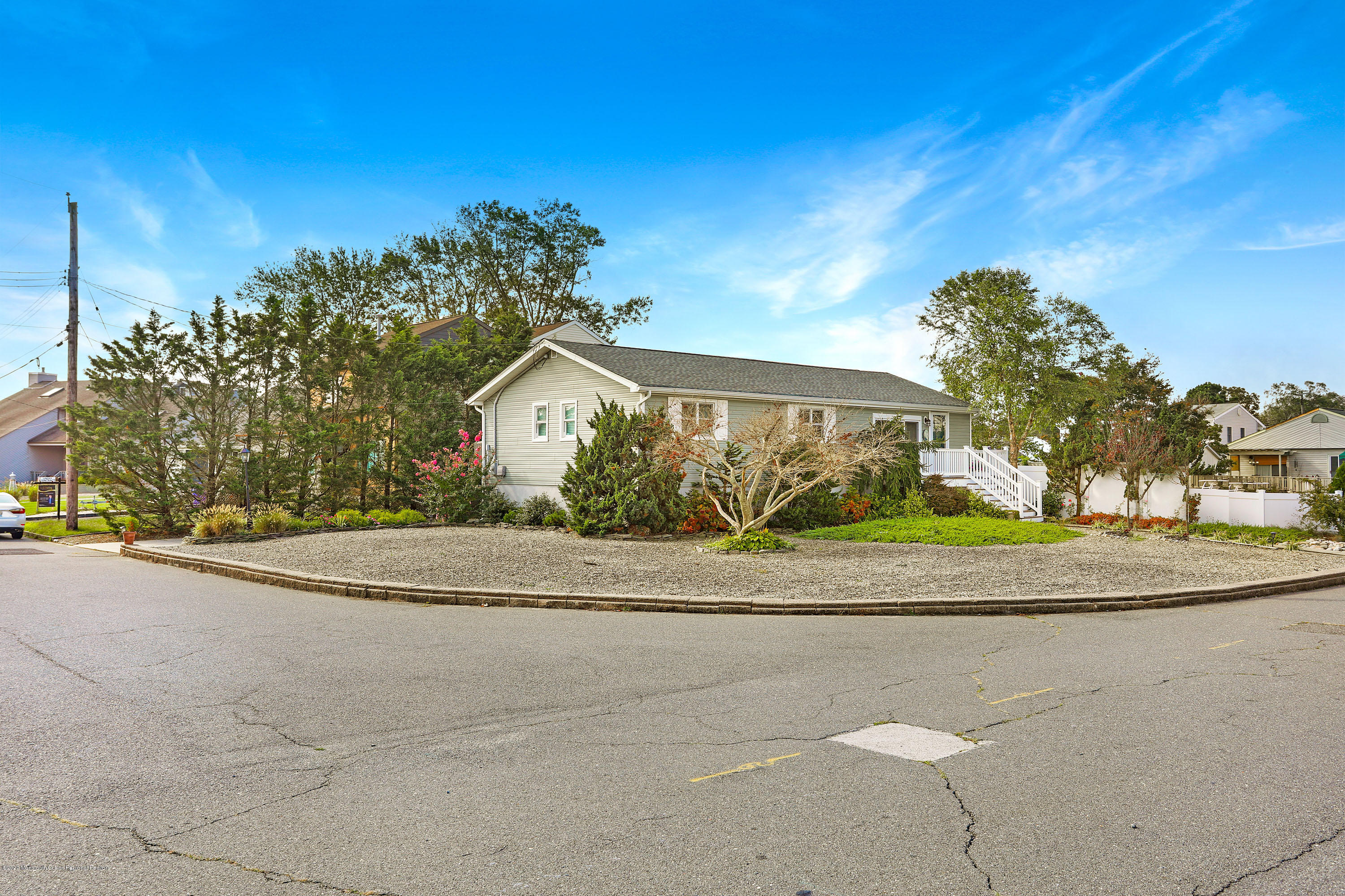 77 Jib Lane Brick, NJ 08723 - Photo 2 of 23 a view of a house with a street