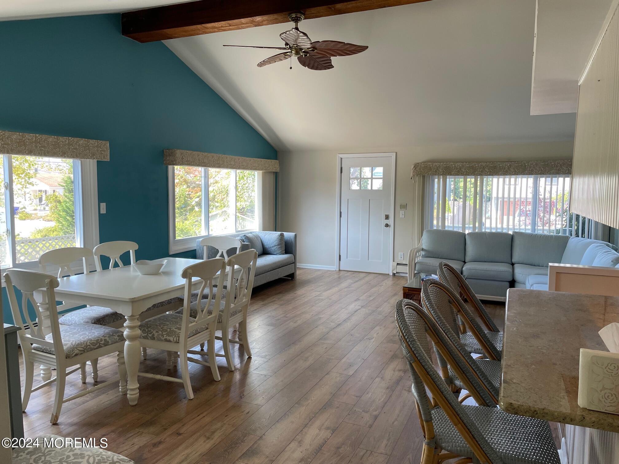77 Jib Lane Brick, NJ 08723 - Photo 6 of 23 a view of a dining room with furniture window and wooden floor