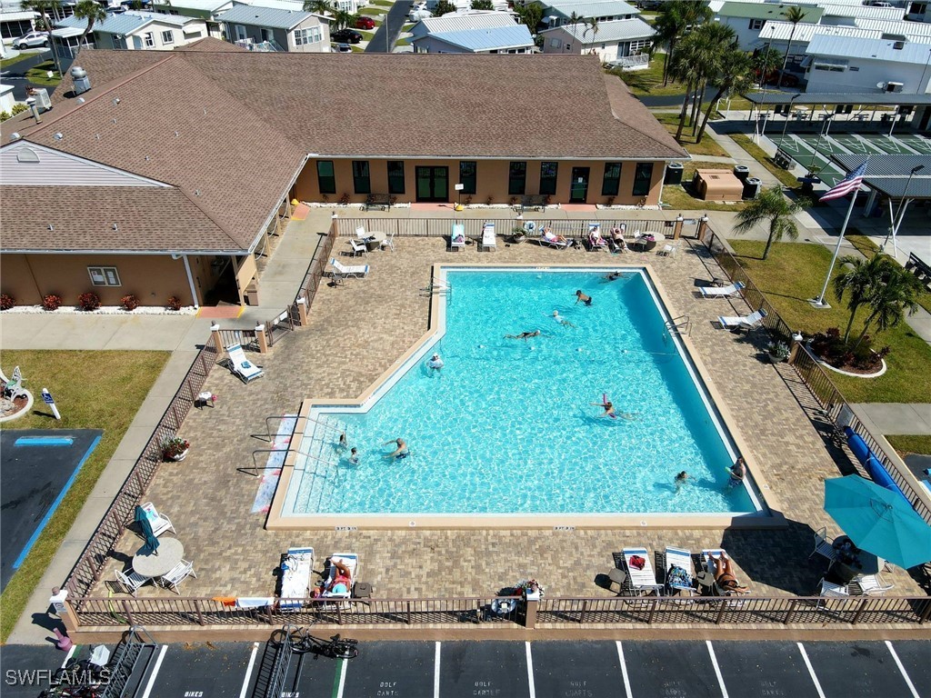 19681 Summerlin Road, Unit 527 Fort Myers, FL 33908 - Photo 5 of 10 an aerial view of a house with a yard