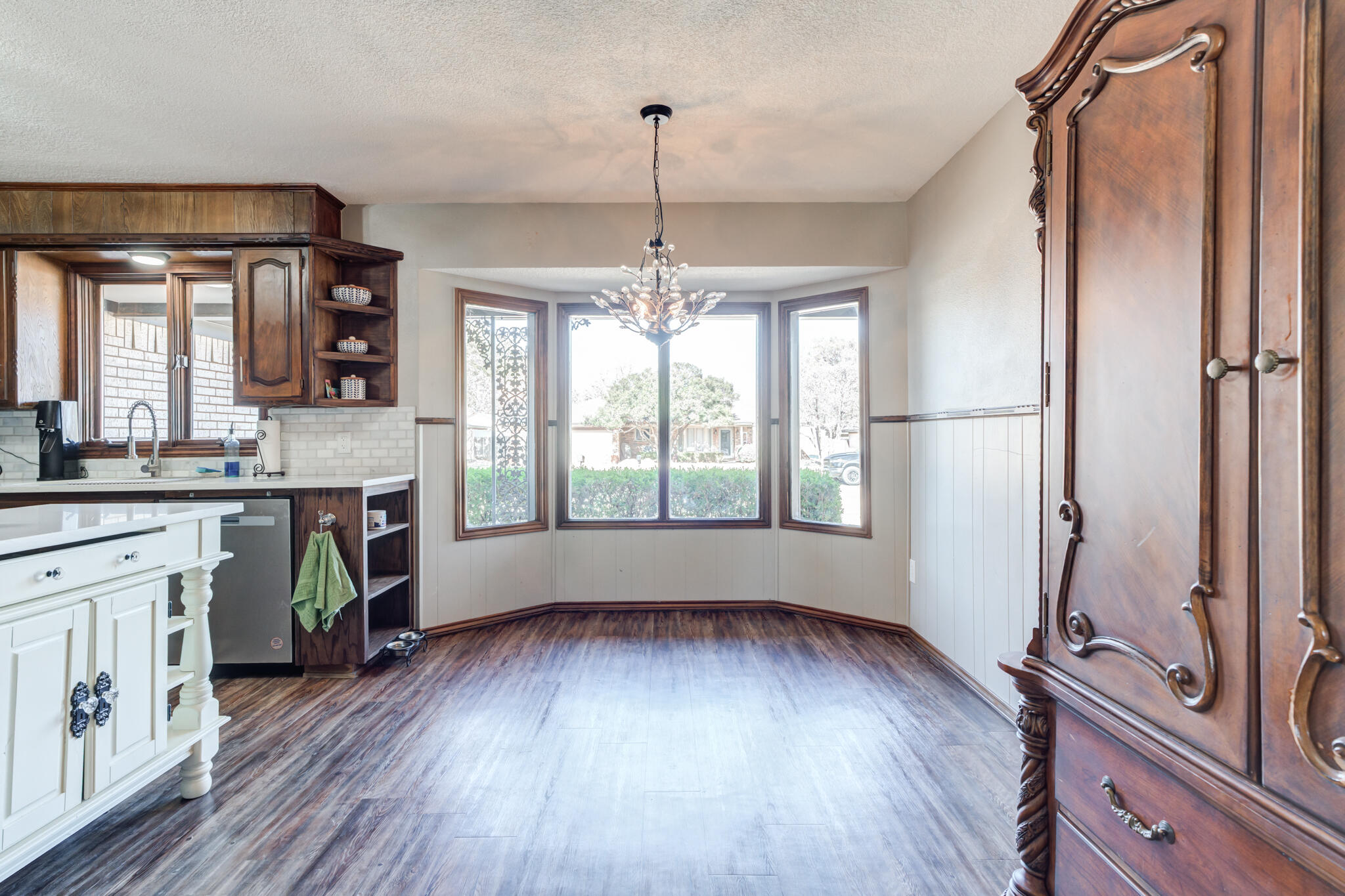 5703 80th Street Lubbock, TX 79424 - Photo 19 of 45 a very nice looking room with wooden floors and a window