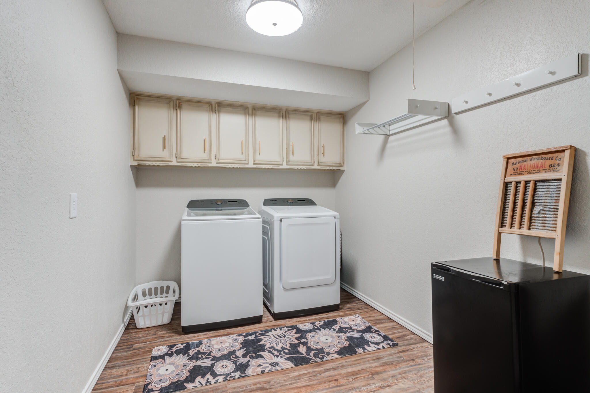 5703 80th Street Lubbock, TX 79424 - Photo 26 of 45 a view of a storage & utility room with a window