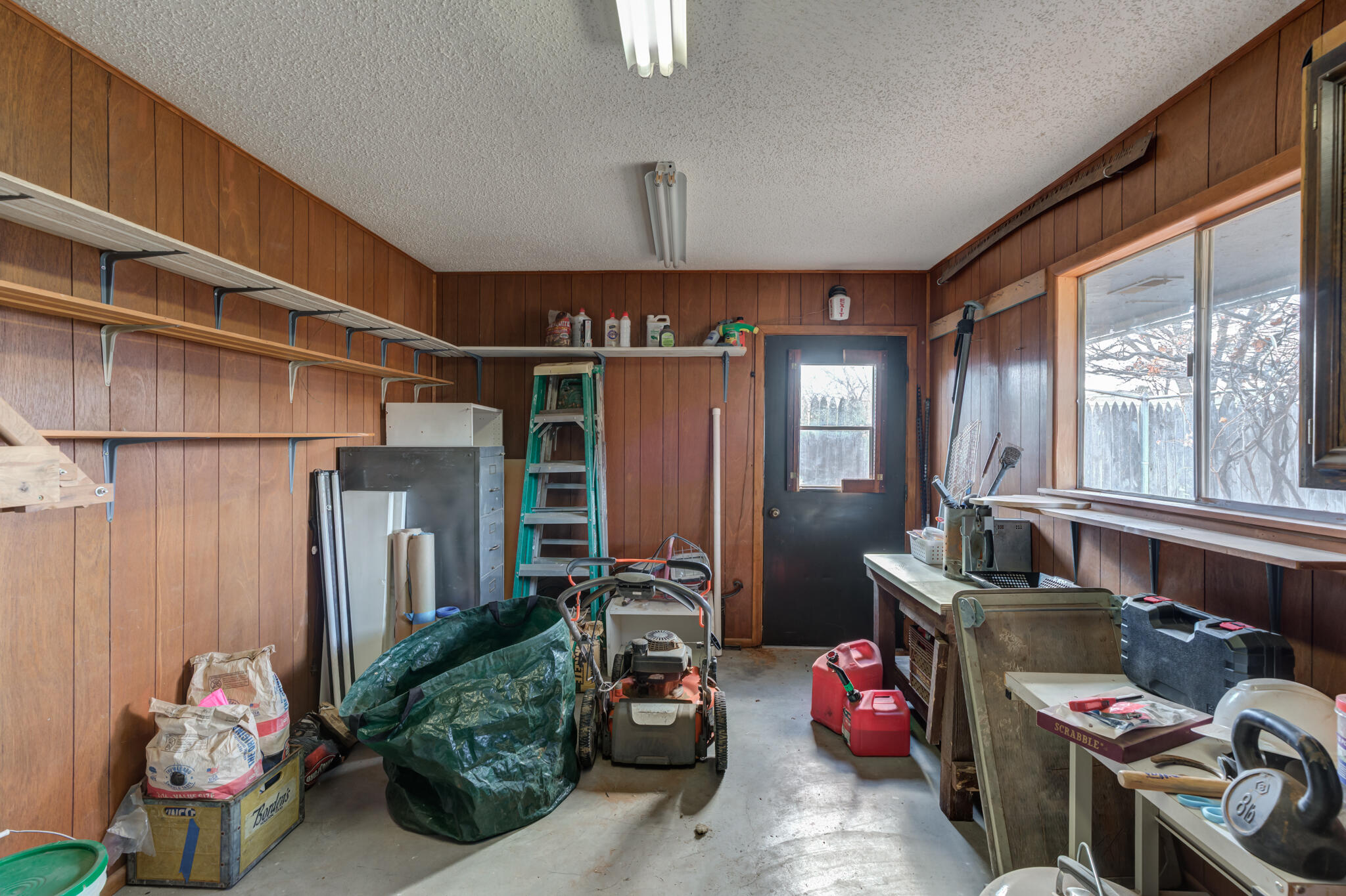 5703 80th Street Lubbock, TX 79424 - Photo 44 of 45 a living room with furniture and a window