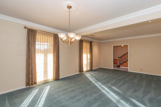 a view of a livingroom with furniture and a fireplace