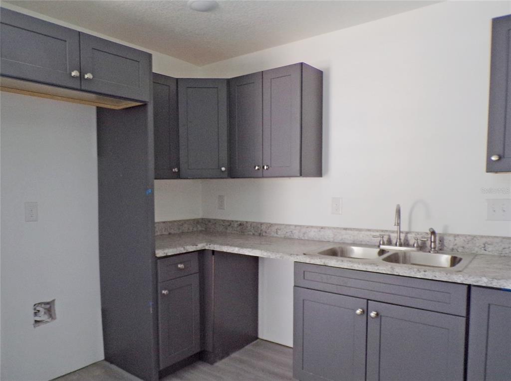 4341 Northwest 154th Street Reddick, FL 32686 - Photo 6 of 11 All kitchens will have SS appliances