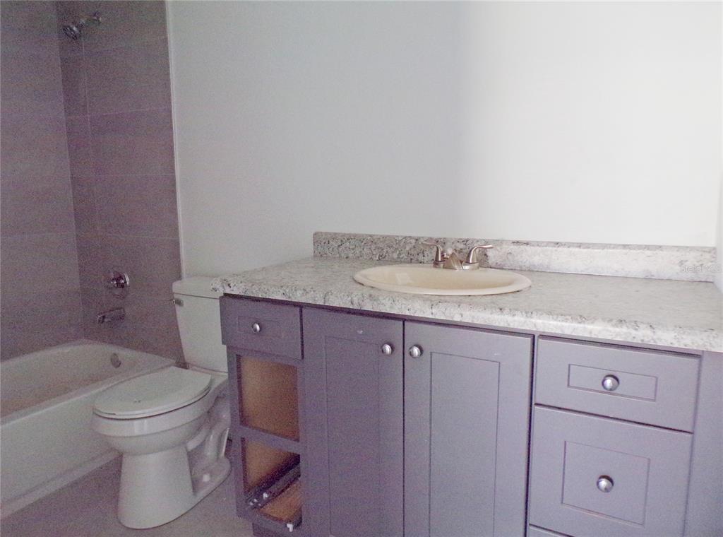 4341 Northwest 154th Street Reddick, FL 32686 - Photo 10 of 11 Single Sink, tile floor and tub in guest bath