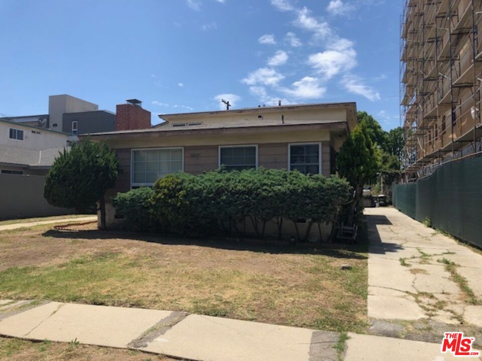 8837 Ramsgate Avenue Los Angeles, CA 90045 - Photo 3 of 3 a front view of house with yard and trees around