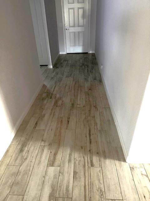 505 Bermuda Avenue Lancaster, TX 75146 - Photo 11 of 17 a view of empty room with wooden floor
