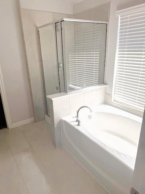 505 Bermuda Avenue Lancaster, TX 75146 - Photo 13 of 17 a bath tub sitting next to a window