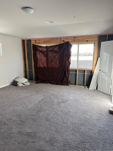 505 Bermuda Avenue Lancaster, TX 75146 - Photo 16 of 17 a view of an empty room with wooden floor and furniture