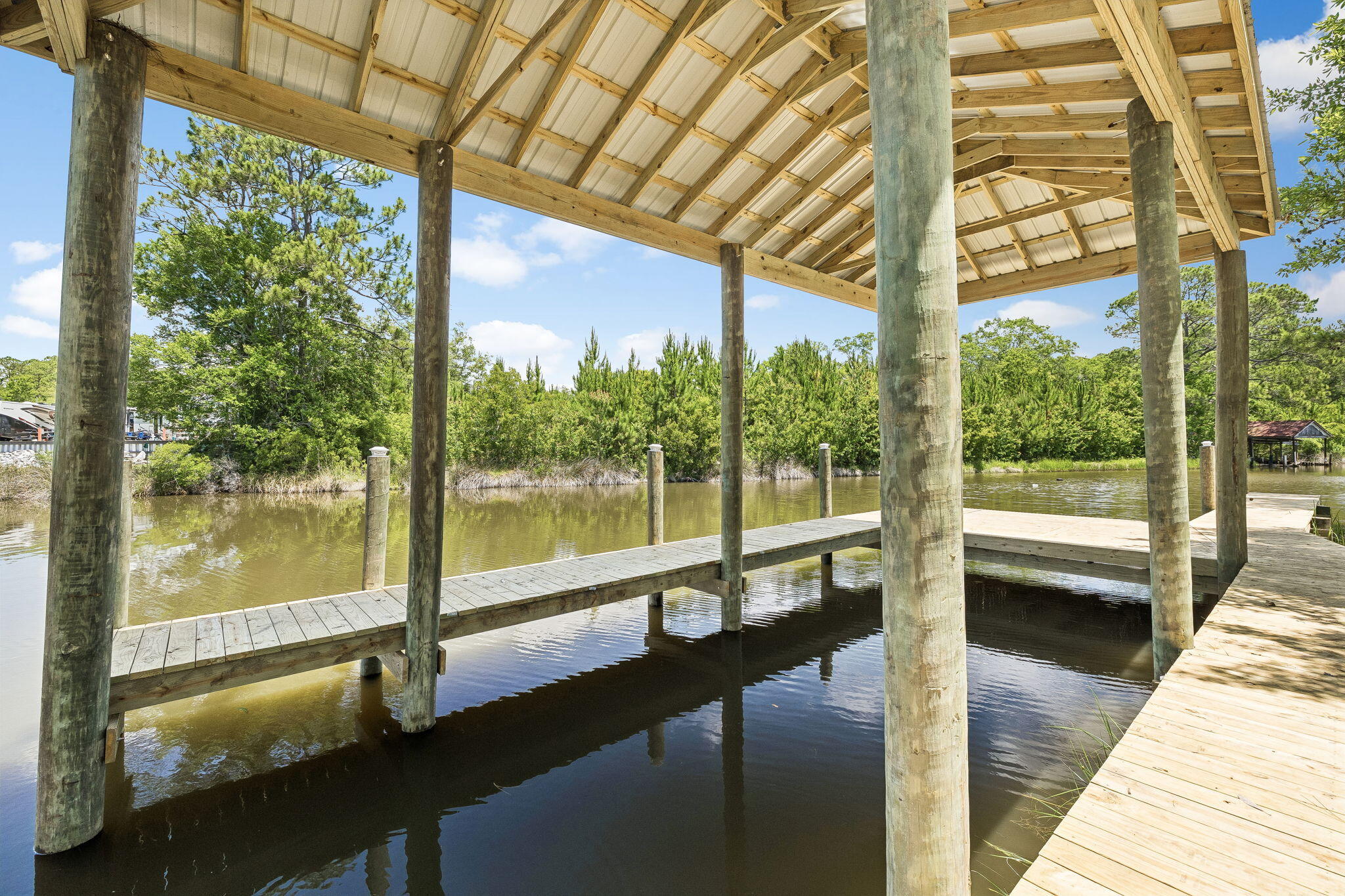 92 Waterside Lane Freeport, FL 32439 - Photo 24 of 28 a view of a balcony with lake view and a ocean view
