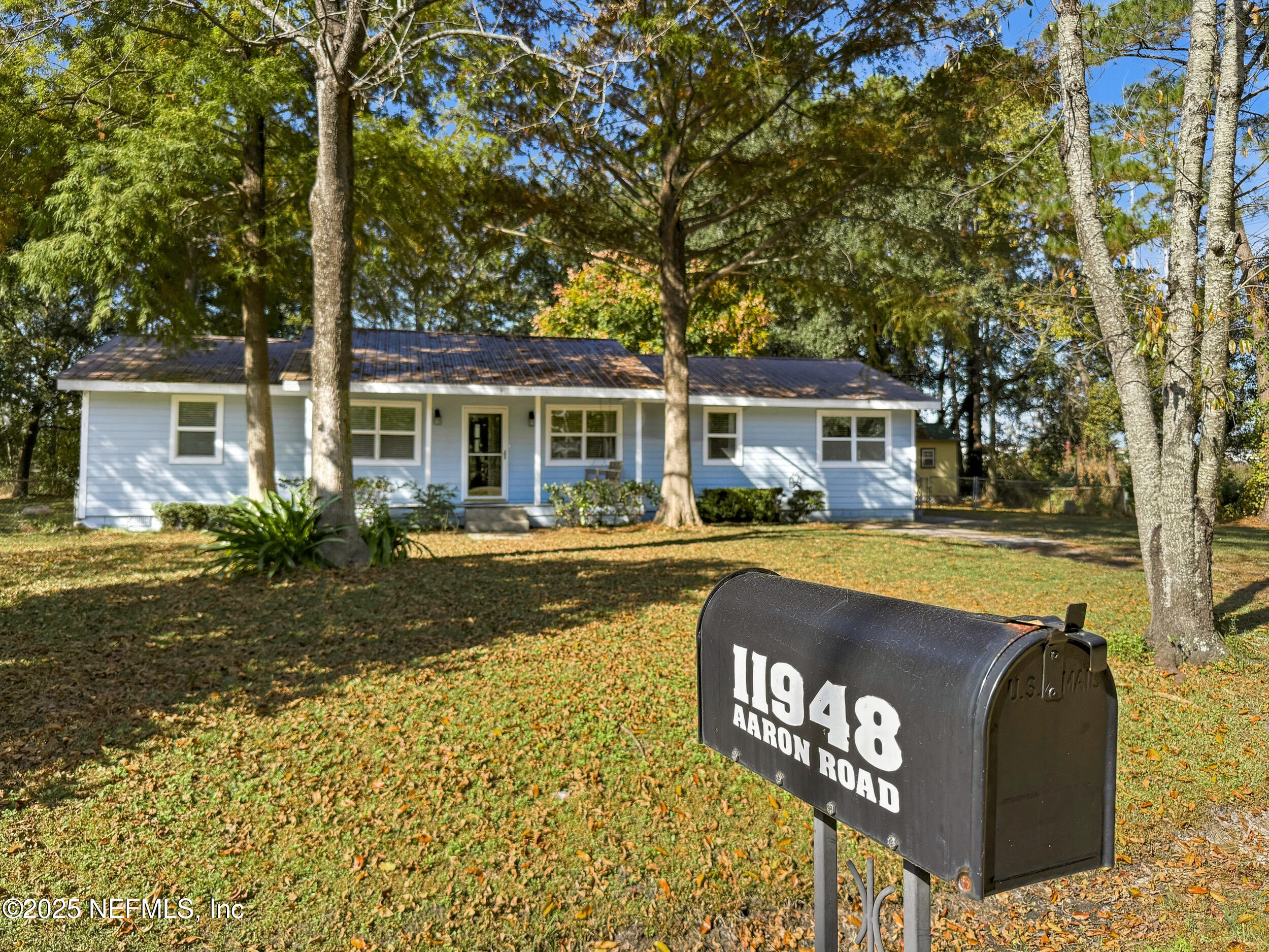 11948 Aaron Road Jacksonville, FL 32218 - Photo 1 of 33 a view of outdoor space yard and swimming pool