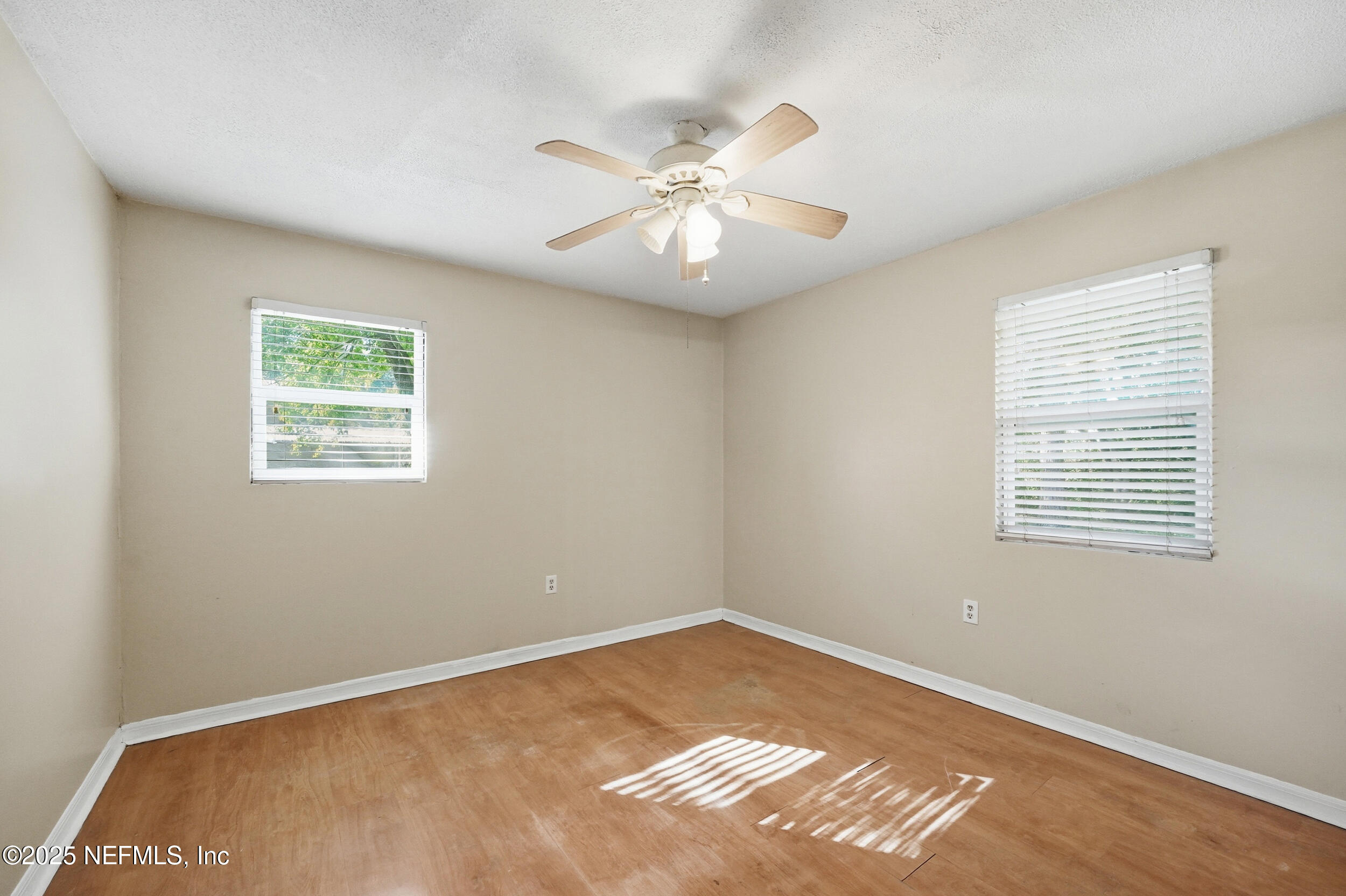 11948 Aaron Road Jacksonville, FL 32218 - Photo 20 of 33 a view of an empty room with a window