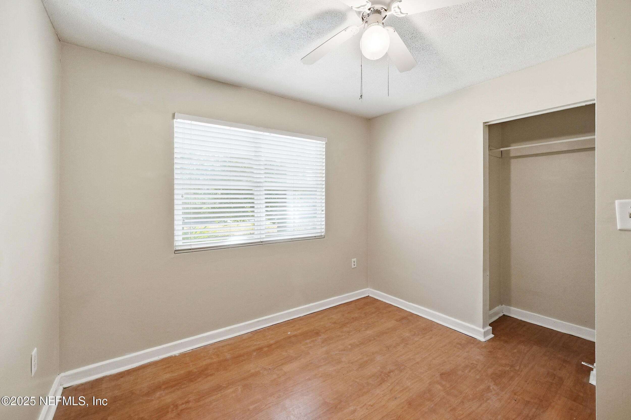 11948 Aaron Road Jacksonville, FL 32218 - Photo 24 of 33 a view of an empty room with a window