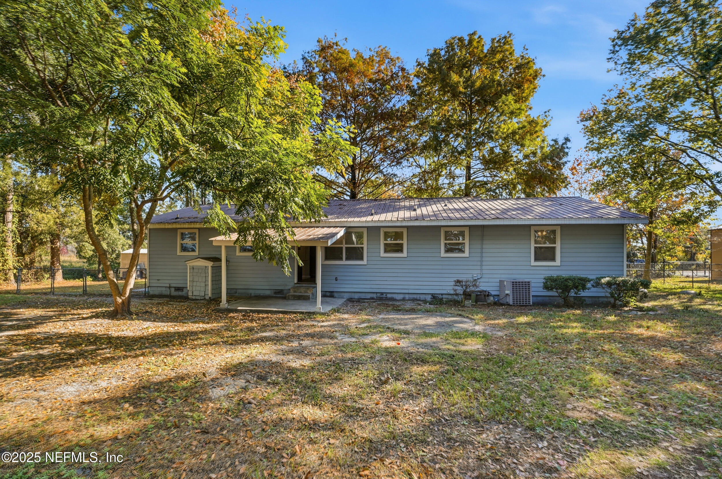 11948 Aaron Road Jacksonville, FL 32218 - Photo 27 of 33 a view of a house with a yard