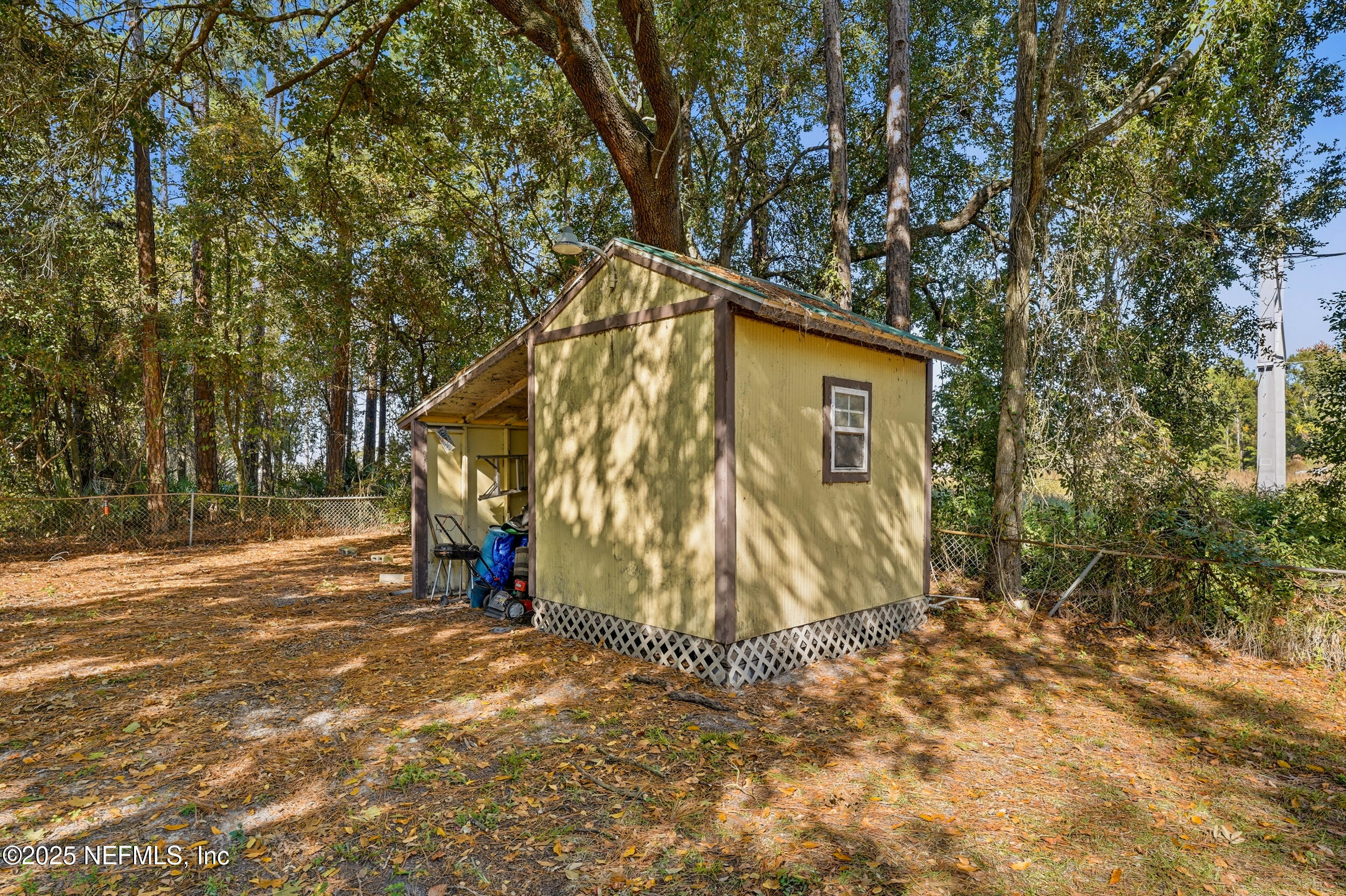 11948 Aaron Road Jacksonville, FL 32218 - Photo 30 of 33 a view of outdoor space with trees