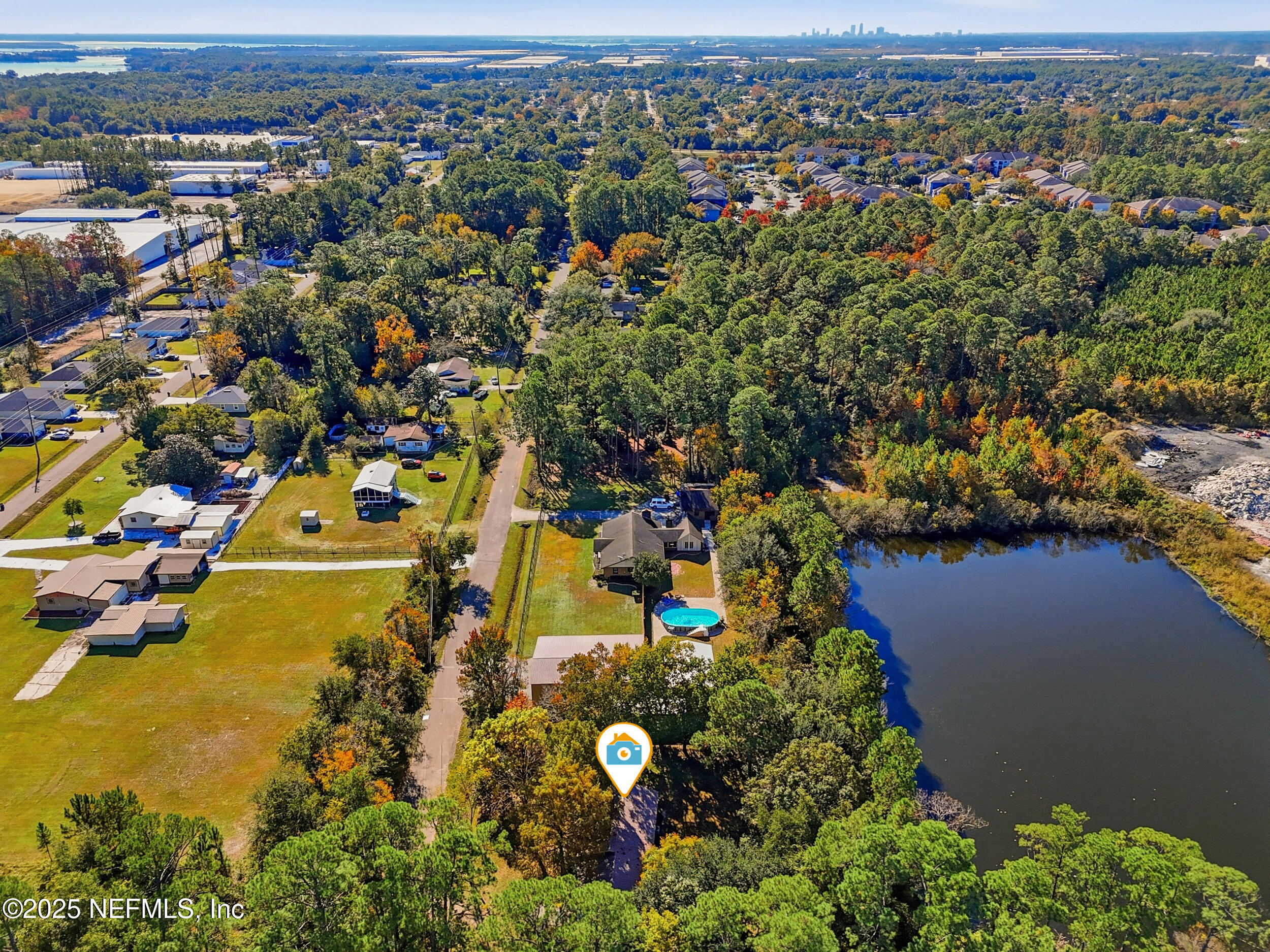 11948 Aaron Road Jacksonville, FL 32218 - Photo 33 of 33 an aerial view of residential houses with outdoor space and trees