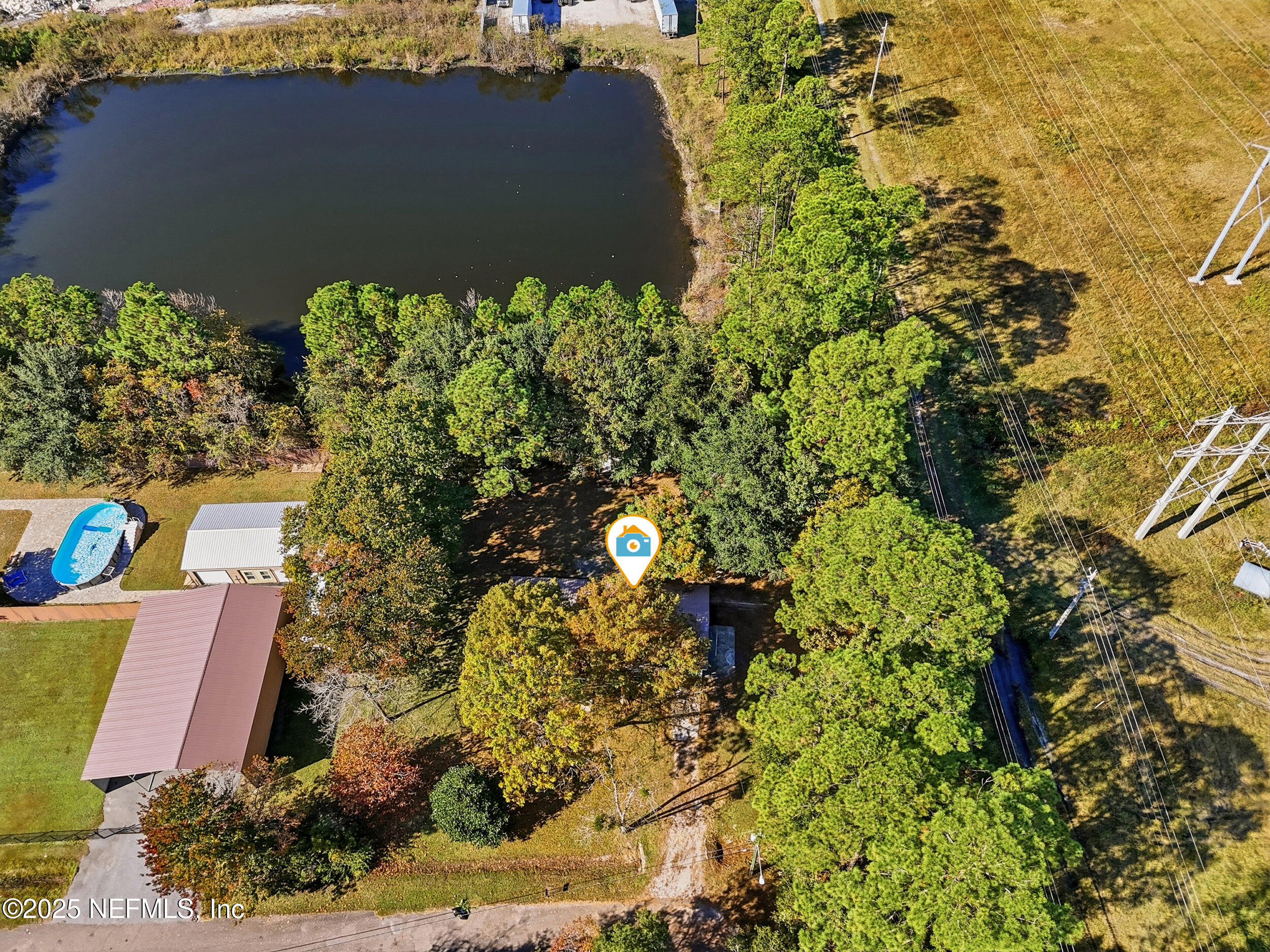 11948 Aaron Road Jacksonville, FL 32218 - Photo 7 of 33 a backyard of a house with lots of green space