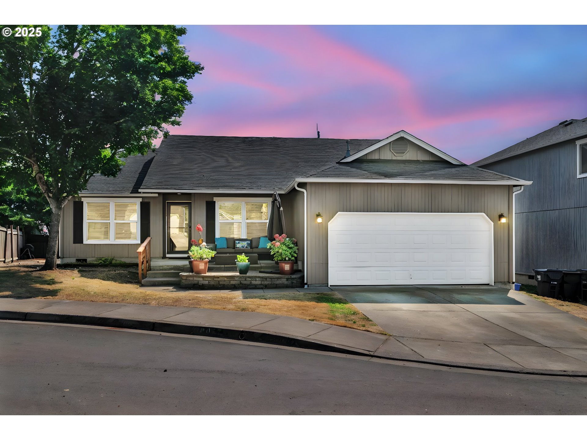 6057 Pebble Court Springfield, OR 97478 - Photo 1 of 42 a front view of a house with yard and garage