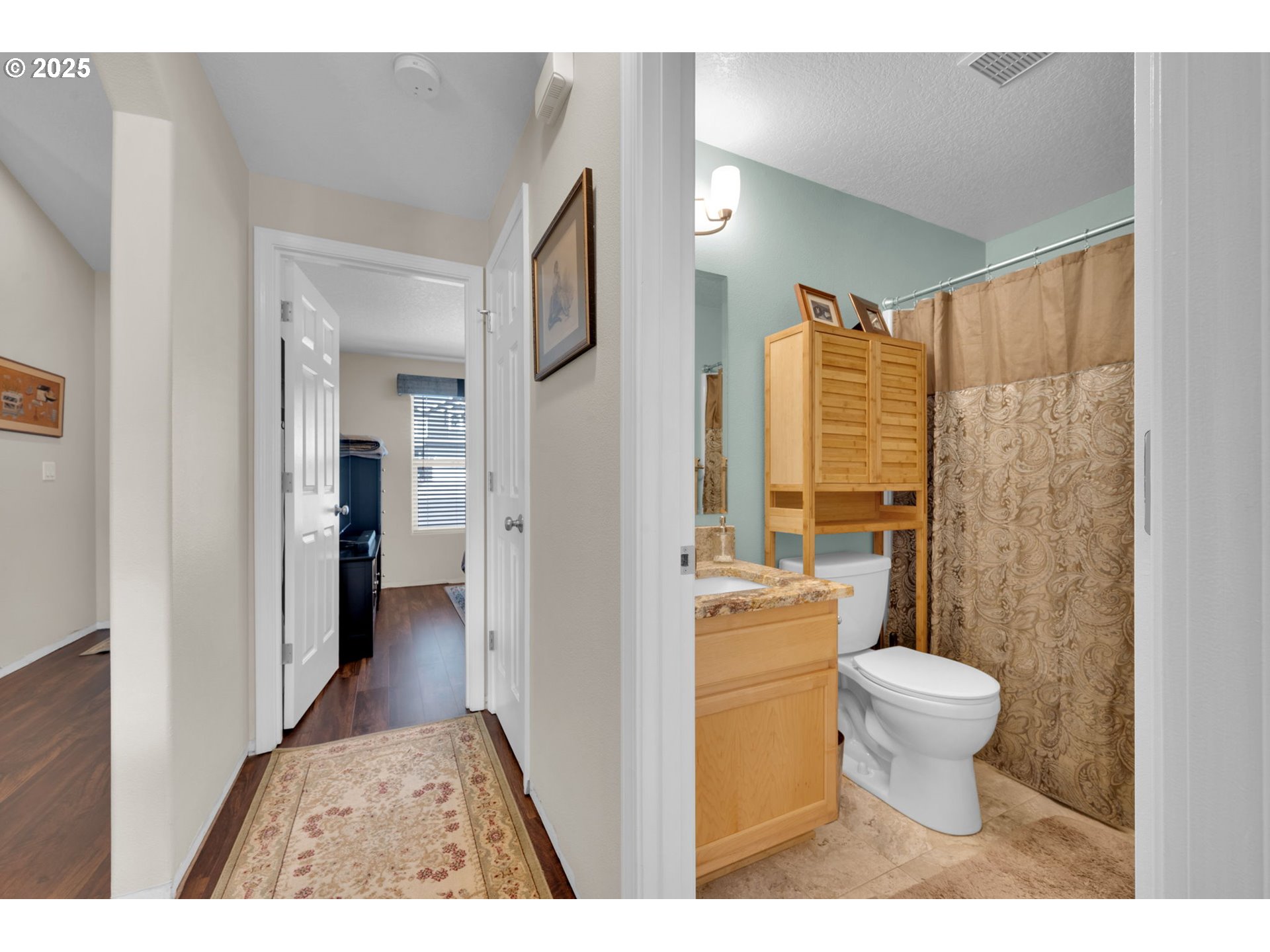 6057 Pebble Court Springfield, OR 97478 - Photo 21 of 42 a bathroom with a sink and a toilet