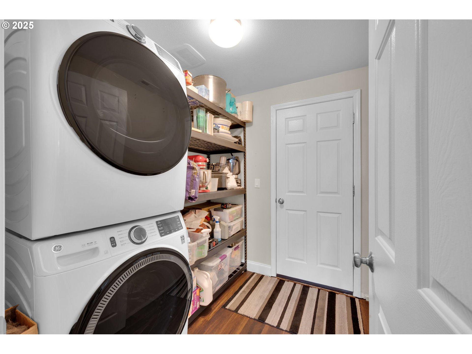 6057 Pebble Court Springfield, OR 97478 - Photo 25 of 42 a view of storage and utility room with washer and dryer