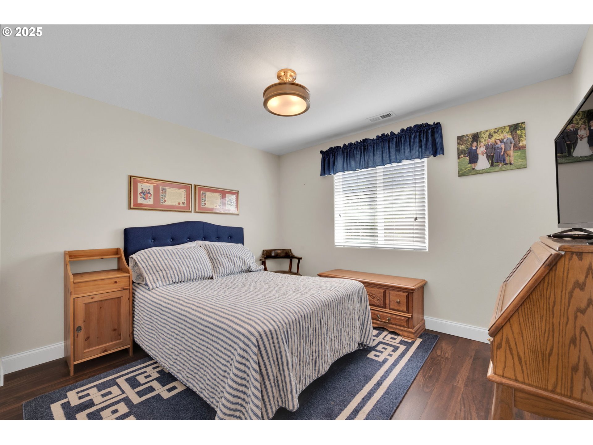6057 Pebble Court Springfield, OR 97478 - Photo 26 of 42 a bedroom with a bed and a window