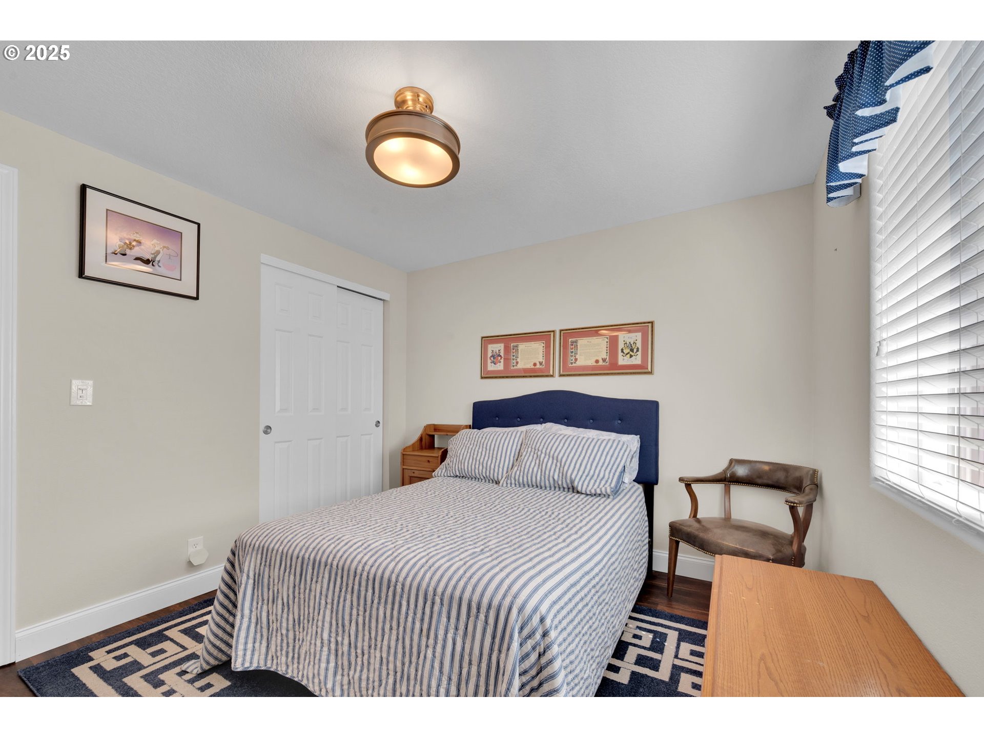 6057 Pebble Court Springfield, OR 97478 - Photo 27 of 42 a bedroom with a bed and a table