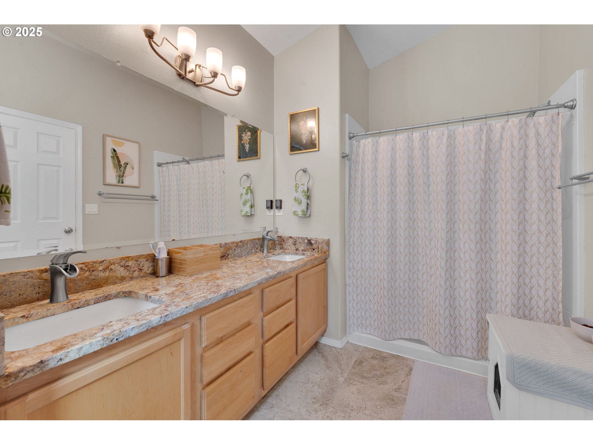 6057 Pebble Court Springfield, OR 97478 - Photo 30 of 42 a bathroom with a granite countertop sink and a mirror